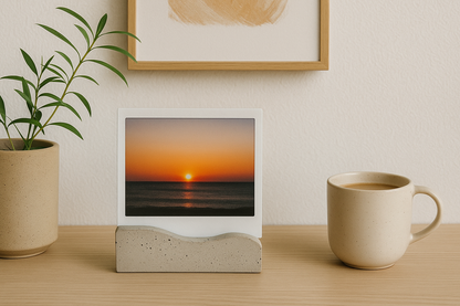 Betoninis laikiklis polaroid nuotraukai